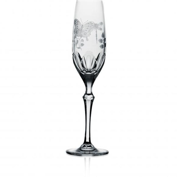 A clear champagne flute with hand-engraved springtime creatures and a flat cut base, made from hand-cut, hand-engraved art crystal.