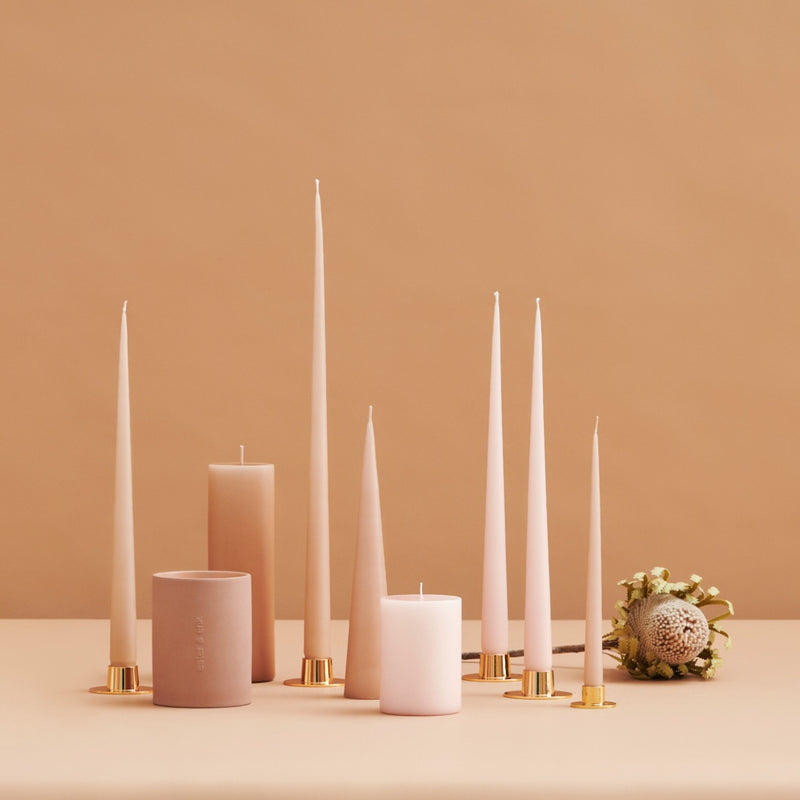 styled gold taper candle holders by Ester & Erik with round minimalist design and durable PVD finish