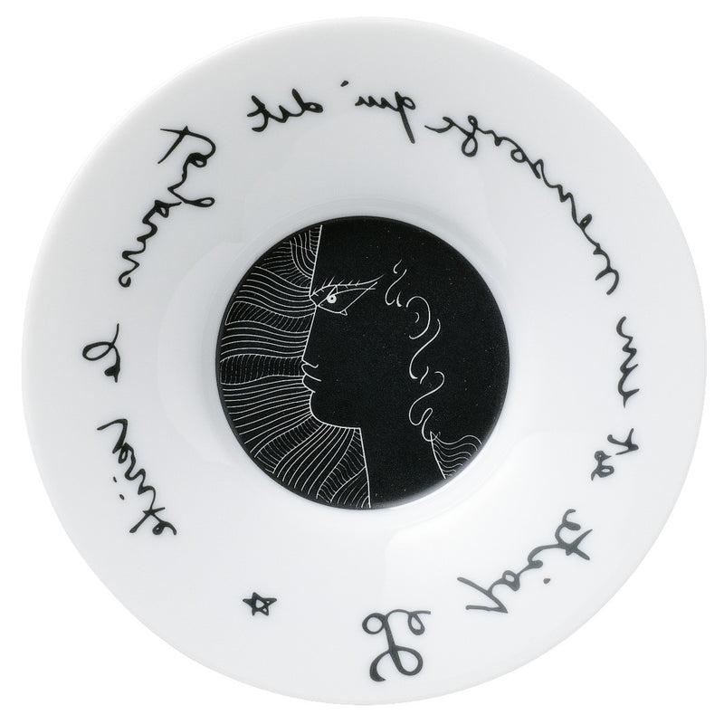 Porcelain saucer with the quote reads: “Le poète est un mensonge qui dit toujours la vérité”