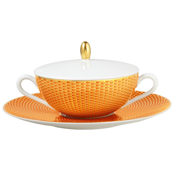 Raynaud Trésor orange porcelain cream soup with lid and saucer with gold-accented honeycomb design
