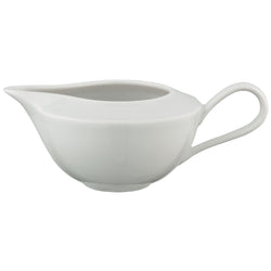 A white porcelain creamer with a sleek design, featuring a smooth, curved body and a rounded handle.