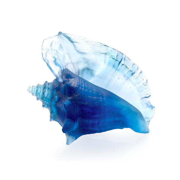 A large blue crystal glass shell sculpture designed by Daum.