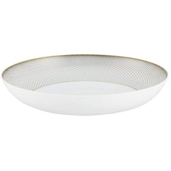 A white, gold, and brown Raynaud porcelain deep plate with geometric motifs.