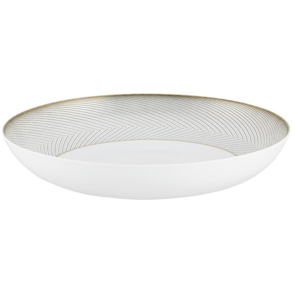 A white, gold, and brown Raynaud porcelain deep plate with geometric motifs.