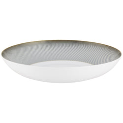 A white, gold, and brown Raynaud porcelain deep plate with geometric motifs.