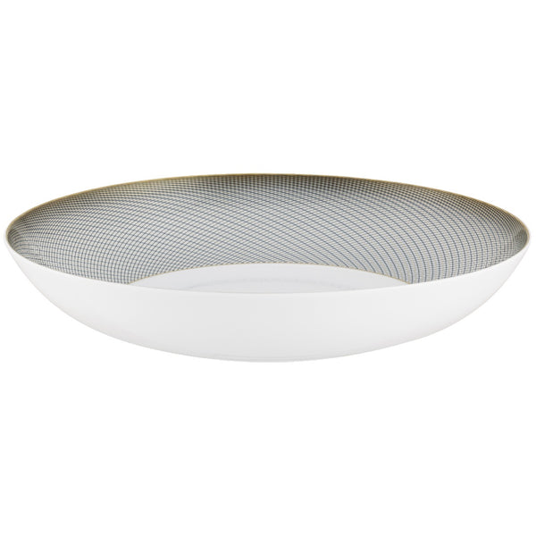A white, gold, and brown Raynaud porcelain deep plate with geometric motifs.
