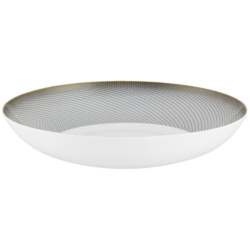 A white, gold, and brown Raynaud porcelain deep plate with geometric motifs.