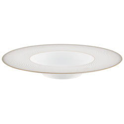 A white, gold, and brown porcelain deep plate with rim, featuring geometric motifs.