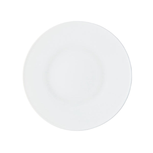 A round white porcelain dessert plate with a smooth surface.