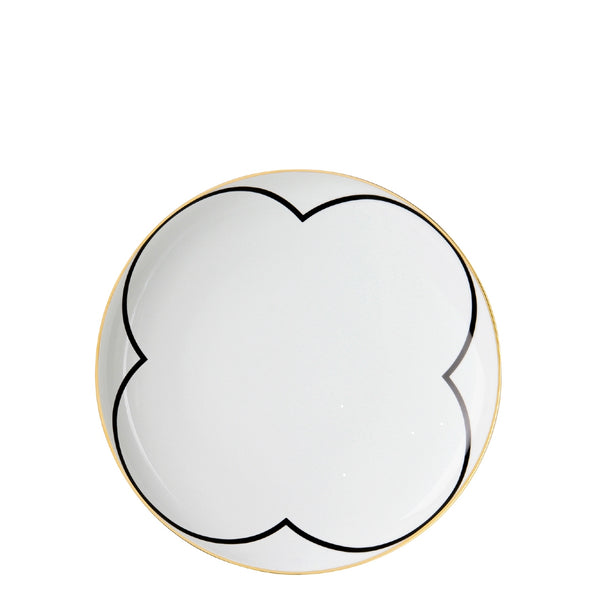 A porcelain coup shaped dessert plate from my china ca d oro collection with black clover like motif and gold rim by sieger furstenberg