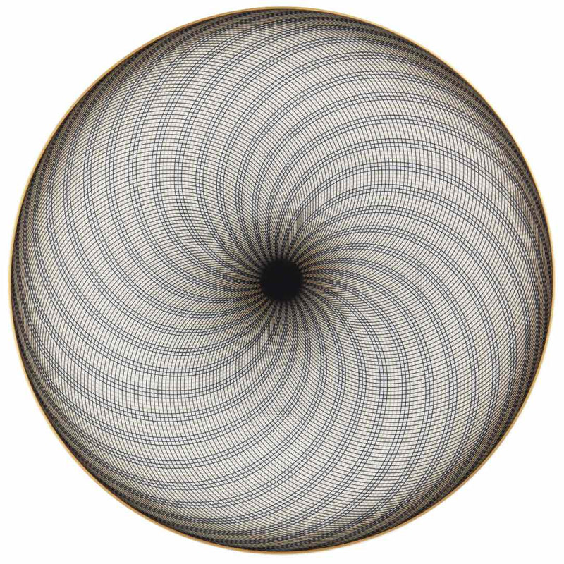 A white porcelain dessert plate with geometric black and gold curves on a plain background.