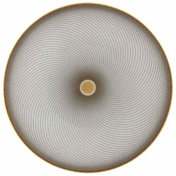 A white porcelain dessert plate with geometric black and gold curves on a gold background.