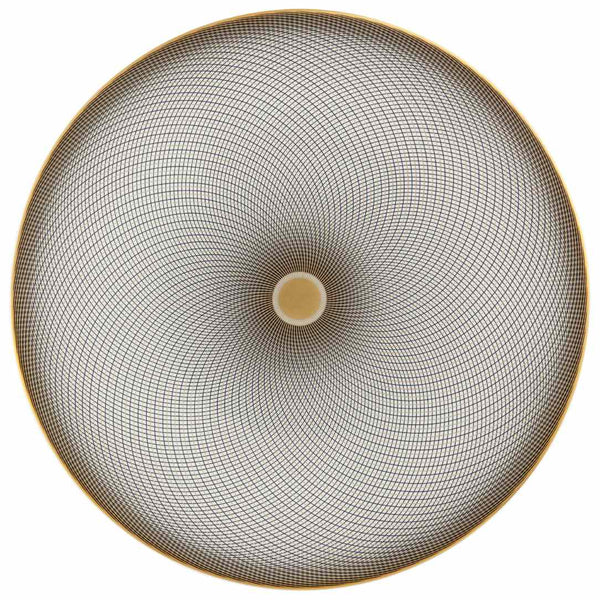 A white porcelain dessert plate with geometric black and gold curves on a gold background.