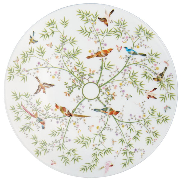 white porcelain plate with small birds and floral design
