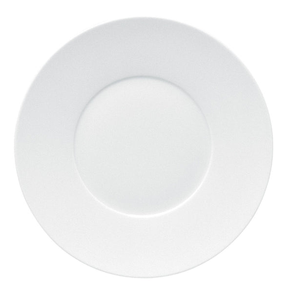 A white, round porcelain dinner plate with a wide rim.