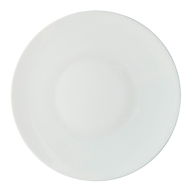 A white porcelain dinner plate with a simple, elegant design from the 'Uni' collection by Raynaud.