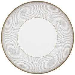 A round white porcelain dinner plate with slender black and gold curves, designed with a geometric pattern.