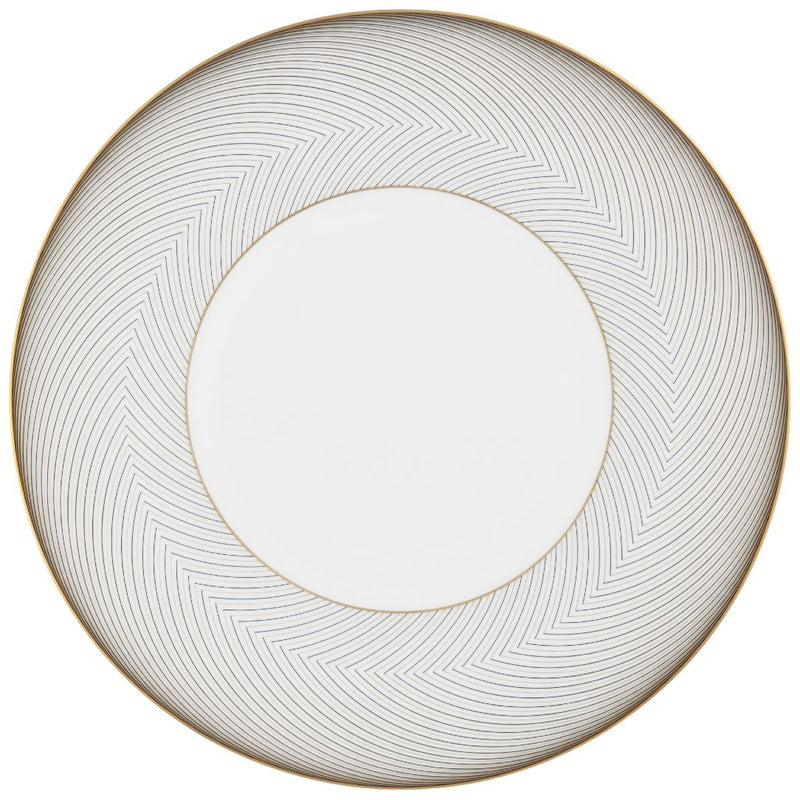 A round white porcelain dinner plate with slender black and gold curves, designed with a geometric pattern.