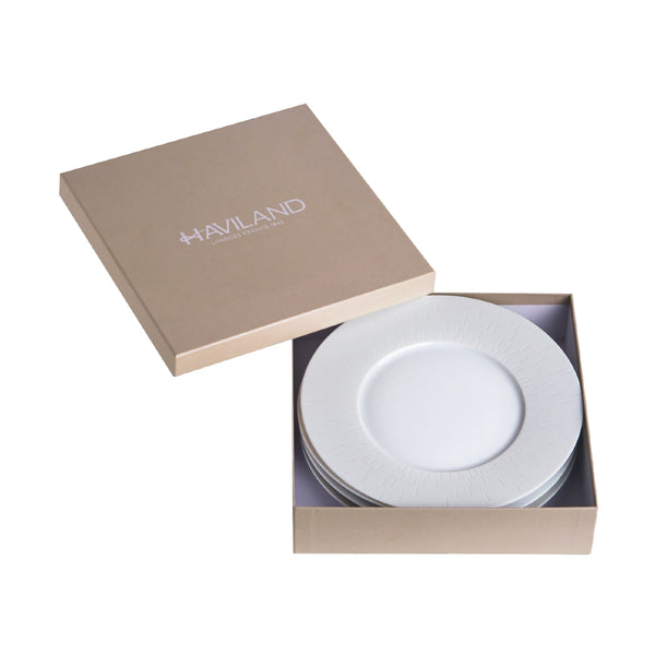A set of 4 white porcelain dessert plates, presented in a branded box with the Haviland logo.