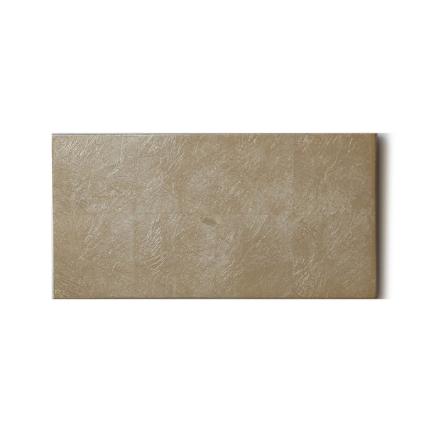 A champagne-colored double coaster made of wood with a matte lacquer finish, designed to hold two glasses side by side.