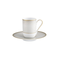 Espresso cup and saucer from the Oskar collection by Raynaud in Limoges porcelain with black and gold Bauhaus-inspired geometric design.