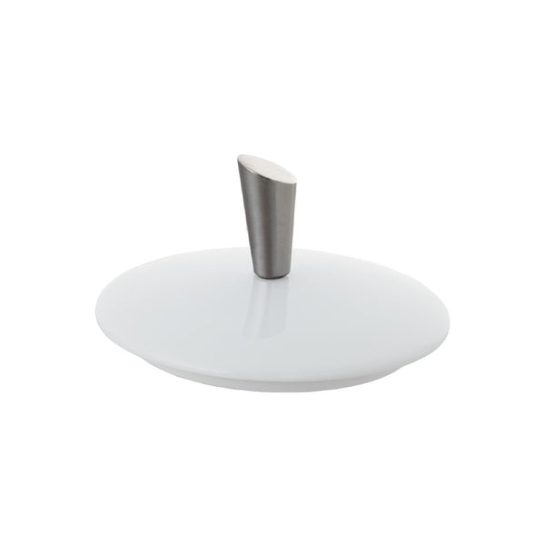 A white porcelain espresso cup lid with a metal handle on top, against a plain background.