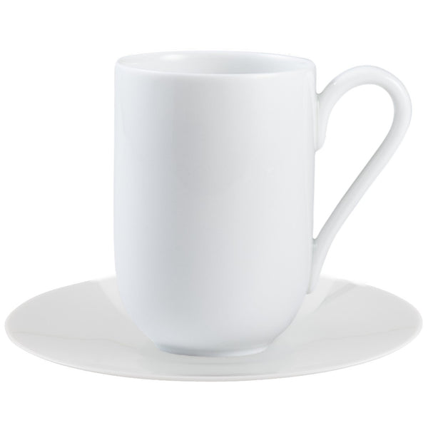 A white porcelain espresso cup with a handle on the side, placed on a matching white saucer.