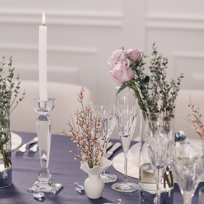 modern table with falda mini vase in white crystal candle holders and flowers