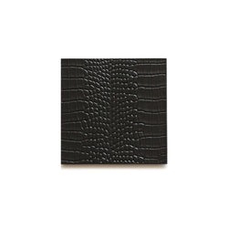 Faux Python coaster in black by Posh Trading Company, deep black luxury resin with reptile texture