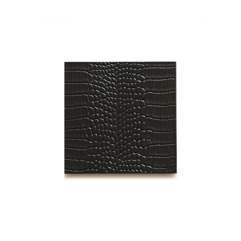 Faux Python coaster in black by Posh Trading Company, deep black luxury resin with reptile texture