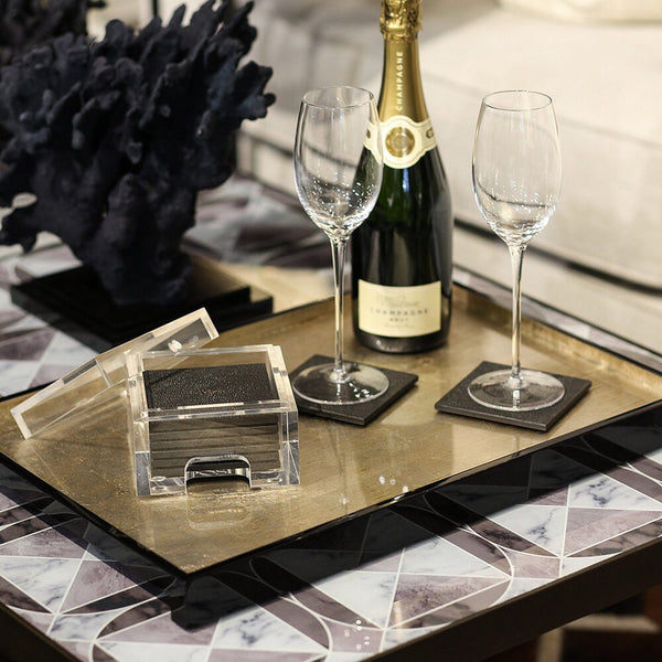 styled coffee table with Faux Shagreen coasters set of 8 in chocolate with clear acrylic holder by Posh Trading Company