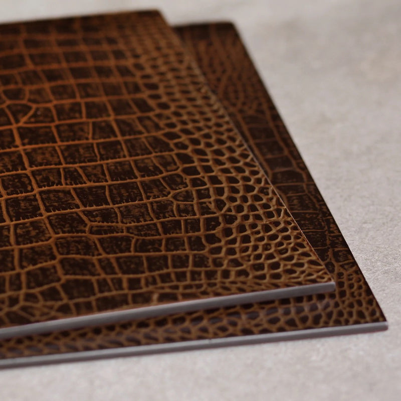 stacked Faux Vintage Croc coaster in brown by Posh Trading Company, textured resin luxury table accessory