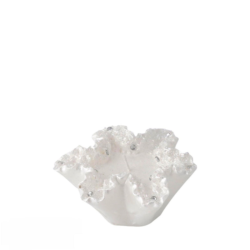 A white and silver glittery coral-shaped candle holder