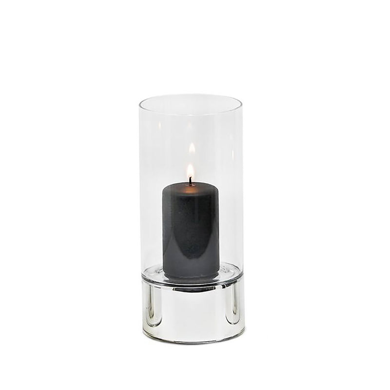 A silver and clear glass hurricane lamp candle holder with a lit candle inside, on a white background.