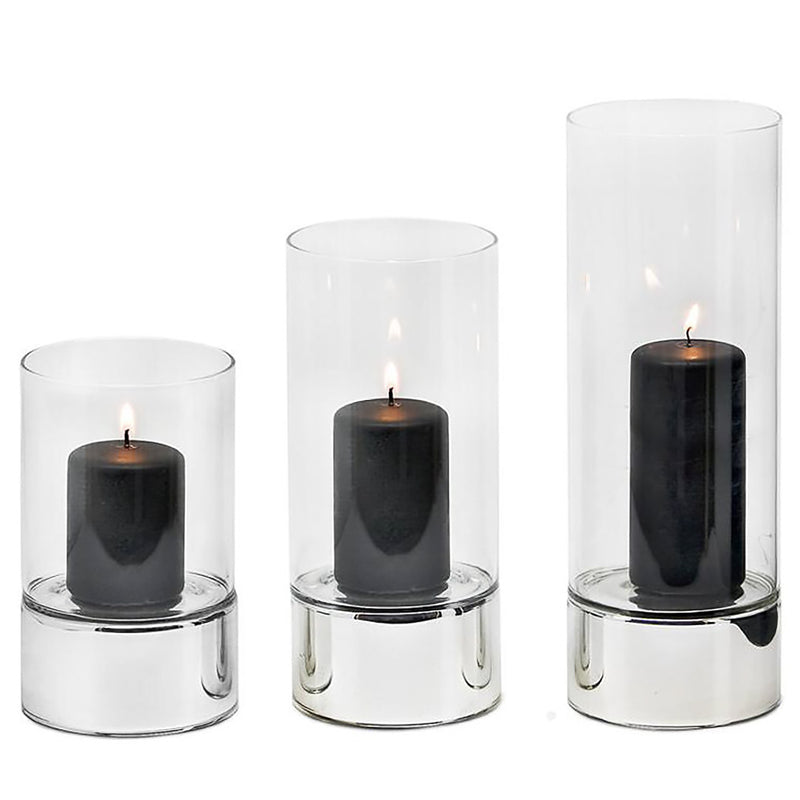 all three sizes of Granada hurricane lamp candle holder by Edzard with silver base and glass cylinder