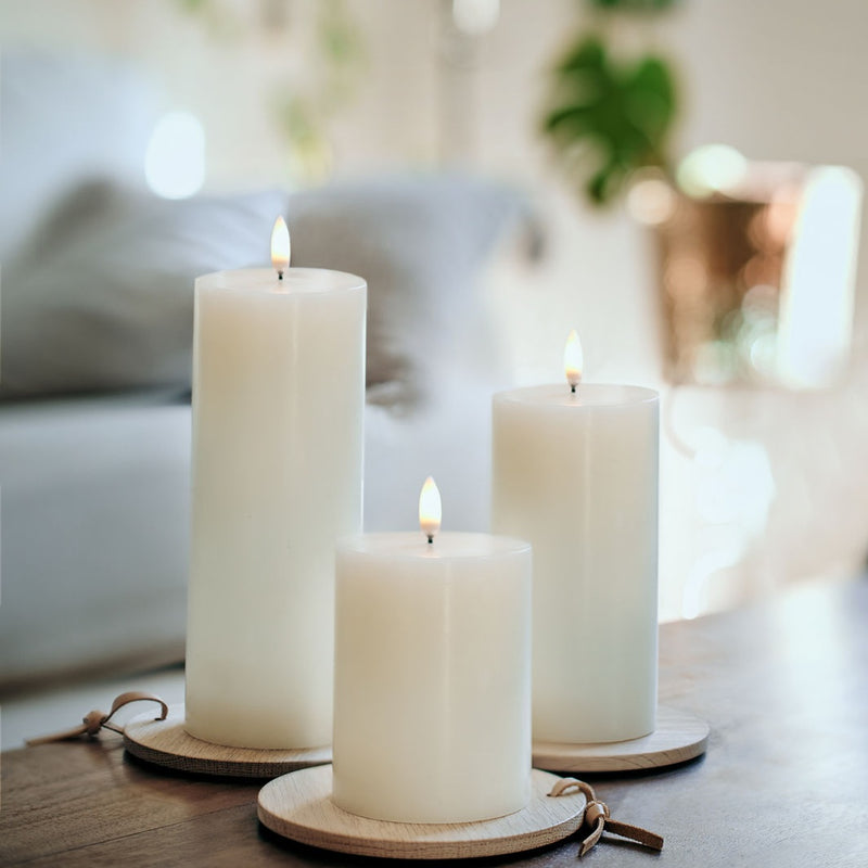 styled trio of LED pillar candle 10cm in Ivory by Uyuni Lighting with real flame effect