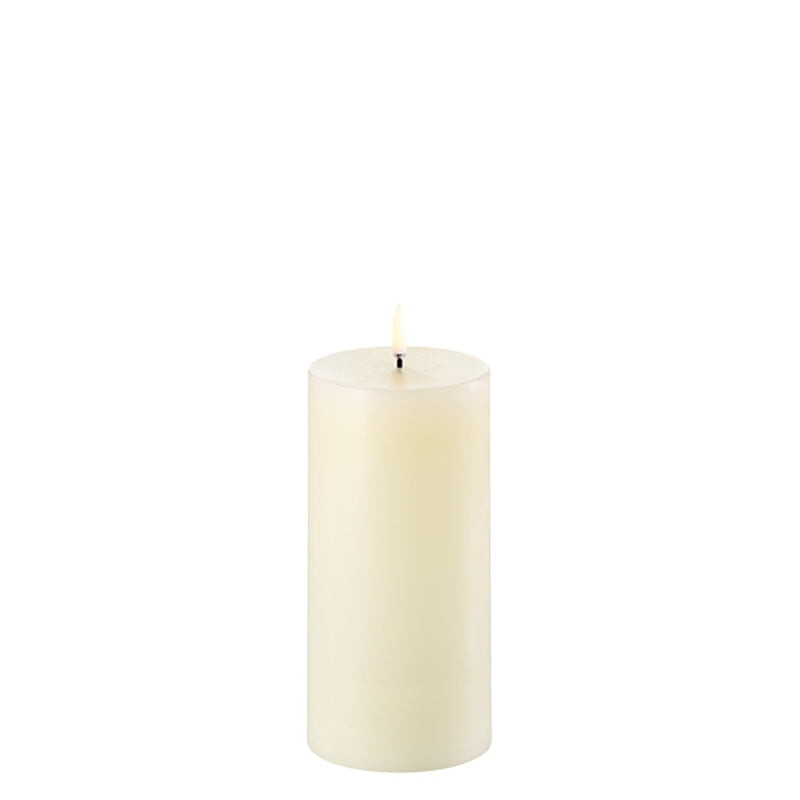 LED pillar candle 15cm in Ivory by Uyuni Lighting with melted wax top and flicker