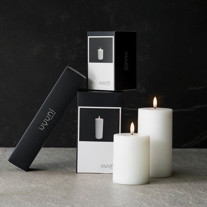 packaging of LED pillar candle in Nordic White by Uyuni Lighting, 10cm tall, real flame effect