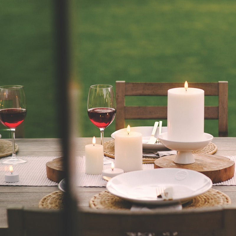 styled table LED pillar candle in Nordic White by Uyuni Lighting, 10cm tall, real flame effect