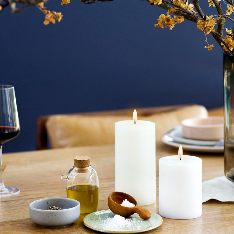 styled 2 sizes LED pillar candle in Nordic White by Uyuni Lighting, 10cm tall, real flame effect
