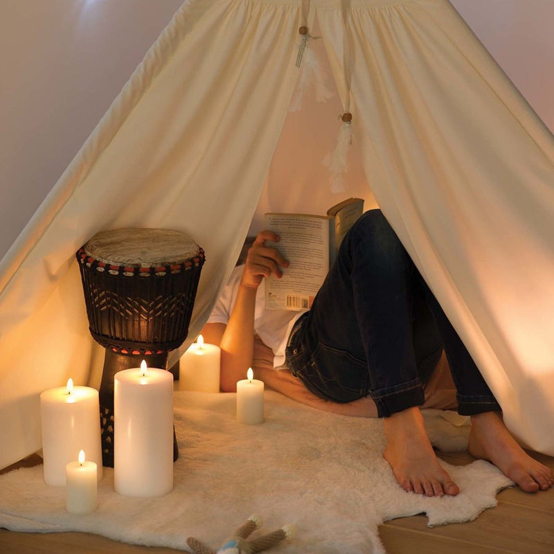 styled nook tent with LED pillar candle 20cm in Nordic White by Uyuni Lighting with real flame effect
