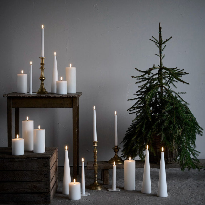 christmas nook with Set of 2 LED taper candles in White by Uyuni Lighting with realistic flame effect