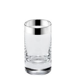 A clear crystal liqueur glass with a silver decoration on the side, part of the 'Fine Silver Decor' collection by Sonja Quandt.