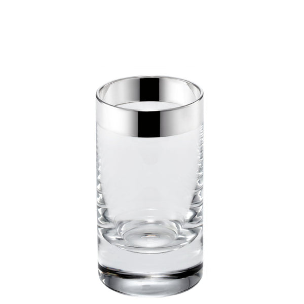 A clear crystal liqueur glass with a silver decoration on the side, part of the 'Fine Silver Decor' collection by Sonja Quandt.