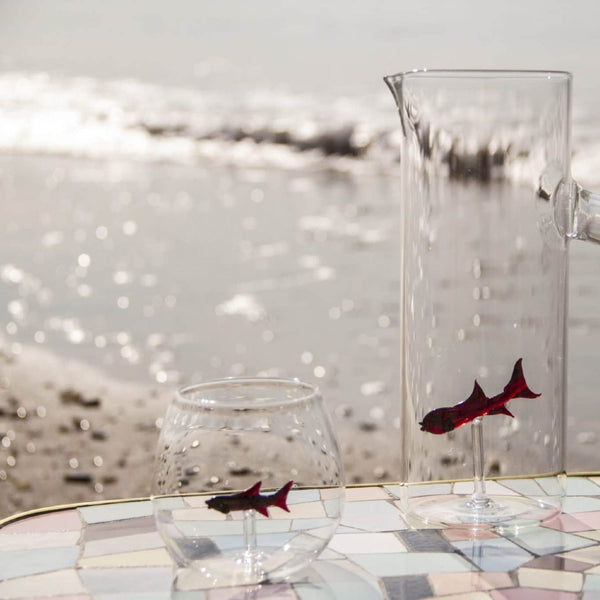 Little Fish round glass tumbler handmade in Venice by Casa Rialto with red fish inside
