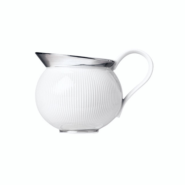 A white porcelain milk jug with platinum detailing and a ribbed texture, with a pouring spout and handle.