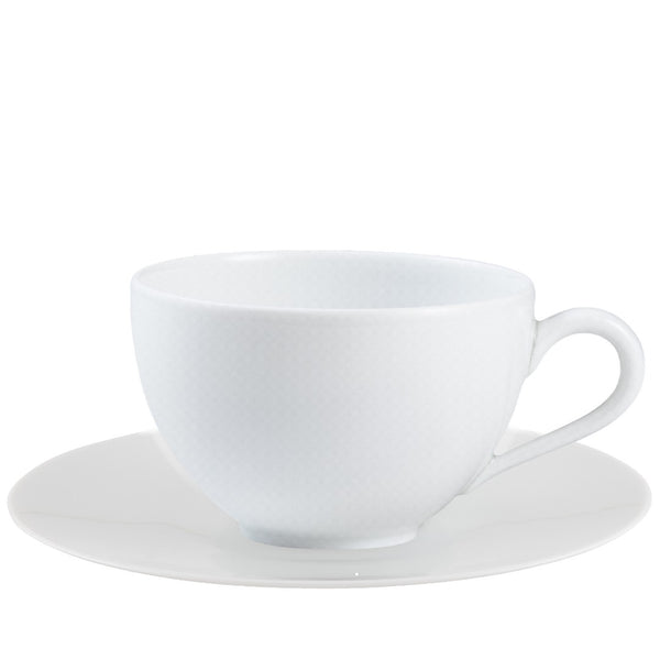 A white porcelain Moka cup with a handle and a matching white saucer.