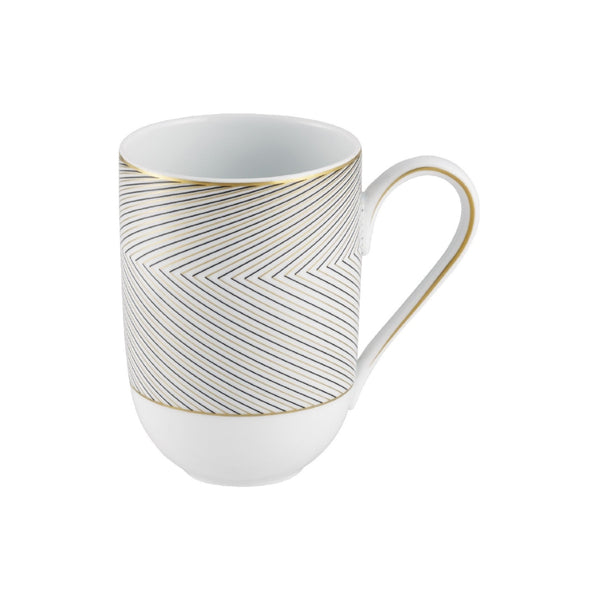 A white porcelain mug with black and gold geometric patterns, featuring a large handle and a tapered design.
