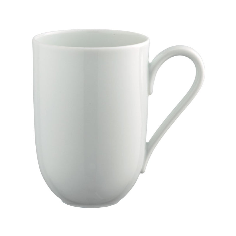 A white porcelain mug with a handle on the right side, presented against a plain background.