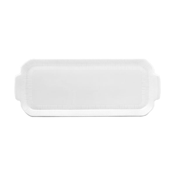 A white, rectangular, porcelain cake platter with a slight lip on the edge.